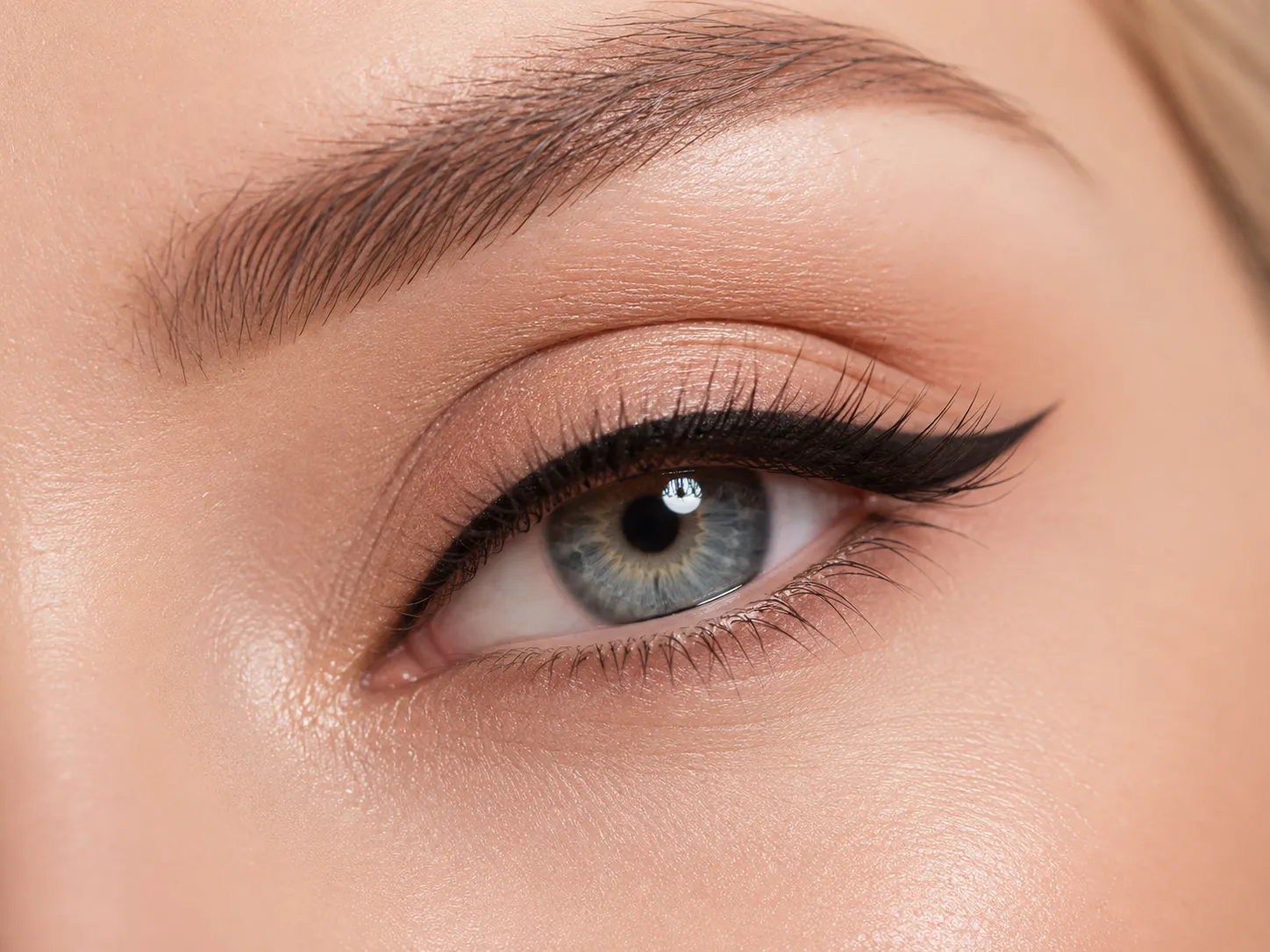 Permanent eyeliner lash enhancement close-up